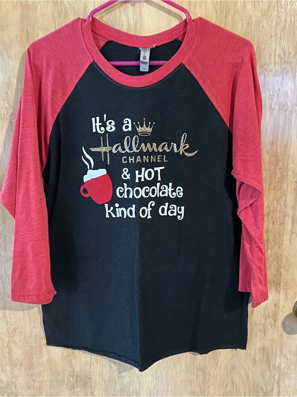 Next Level Apparel Black Raglan Tee with Red Sleeves and Gold Script